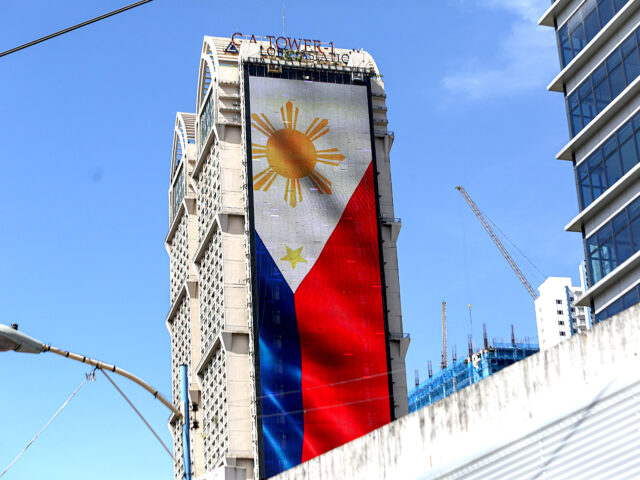 https://www.tripleiconsulting.com/wp-content/uploads/2023/10/philippines-flag-building-640x480.jpg